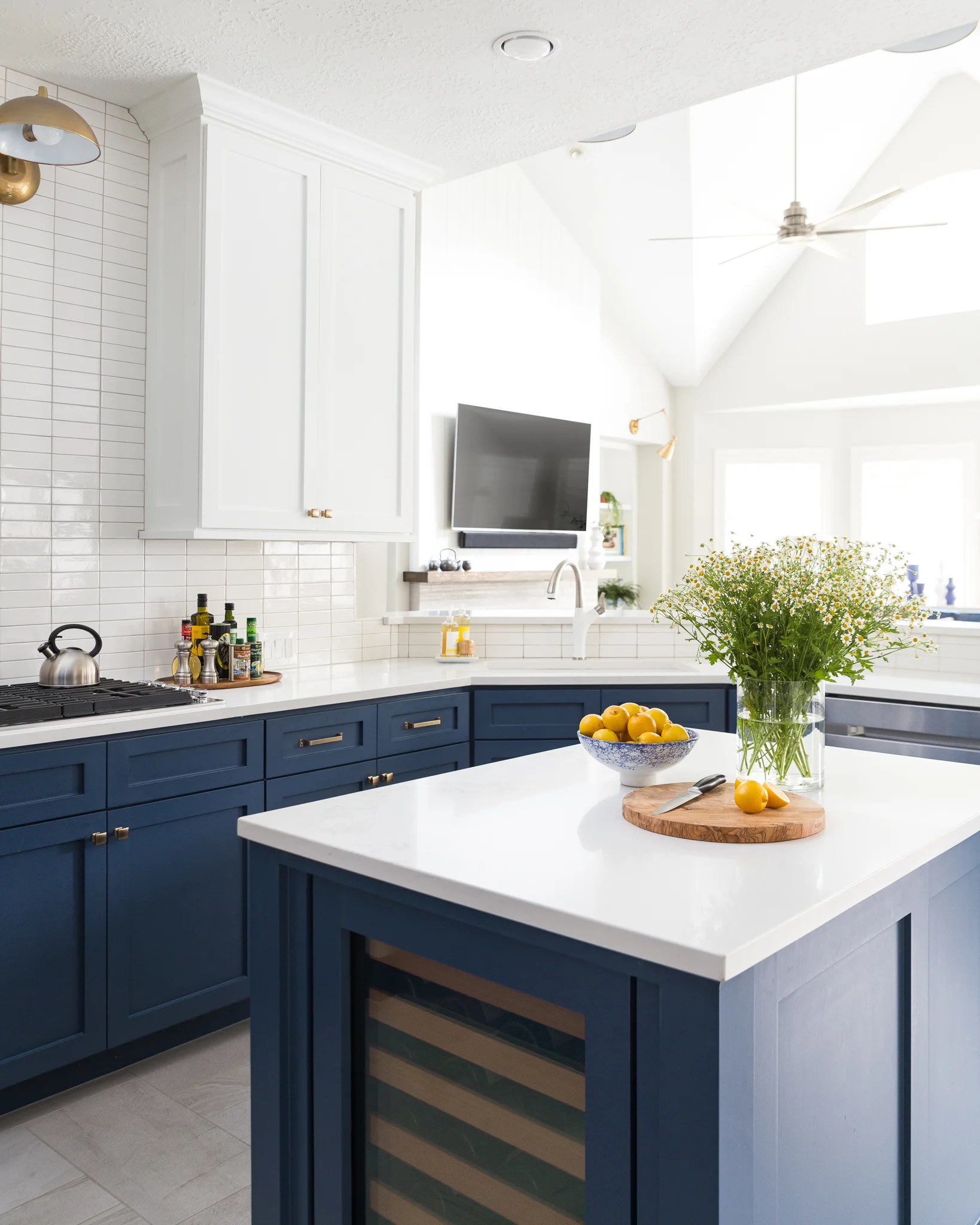 BEFORE AND AFTER A Navy And White Kitchen And Breakfast Nook For A Young Family DESIGNED
